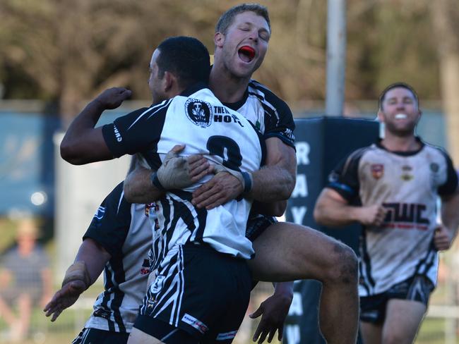 (L-R) Michael Lett and Brendan Shephard crank up the celebrations. Picture: Ian Svegovic