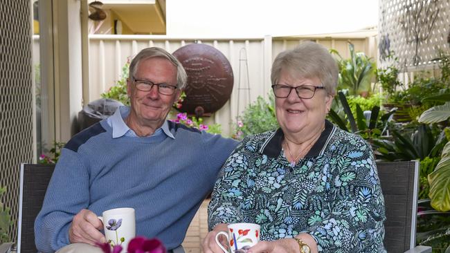 Peter and Margaret Caddy relaxing in their alfresco area. Picture: Roy VanDerVegt