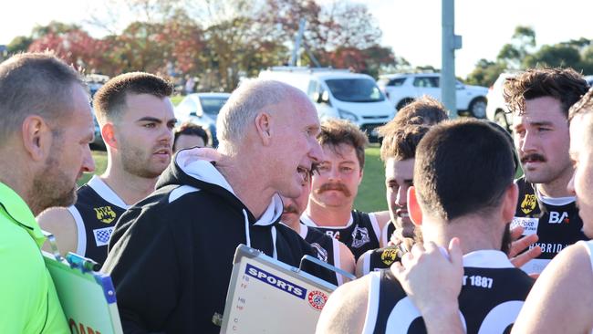 Gumeracha coach Mark Weaver speaks to his players at three quarter time of Saturday’s A Grade match against Kersbrook. Picture: Riley Walter