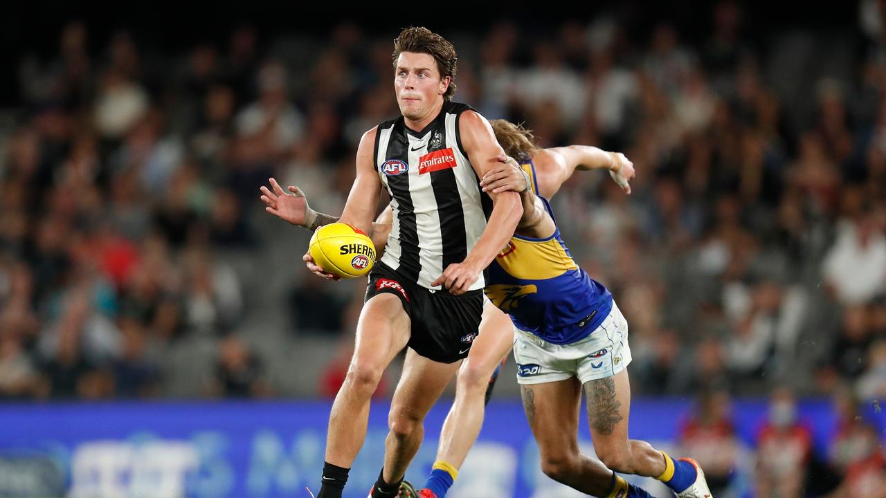 Magpie Patrick Lipinski is run down by Eagle Jamaine Jones. Picture: Michael Willson/AFL Photos