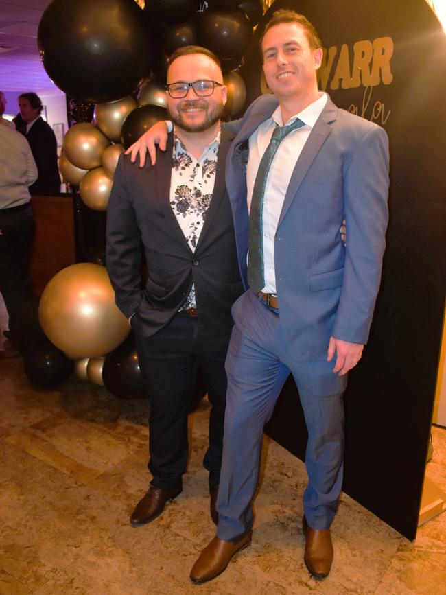 John Burt and Sam Scammell having a great night at the Cowwarr Saints Football &amp; Netball Club Golden Gala Ball 2024. Picture: Jack Colantuono