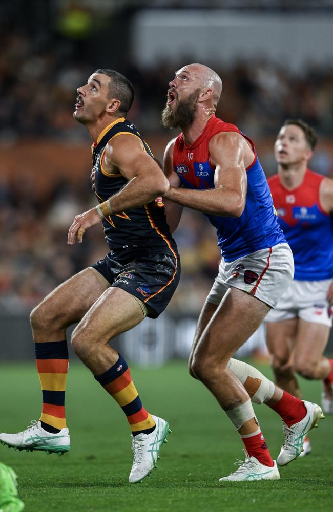 Taylor Walker and Max Gawn on Thursday night. Picture: Mark Brake/Getty Images