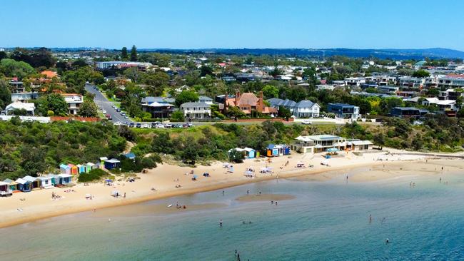 ESCAPE. Mornington Neighbourhood.  The bathing or beach boxes at Mills beach in Mornington on the beautiful Mornington peninsula coast. Photo - istock