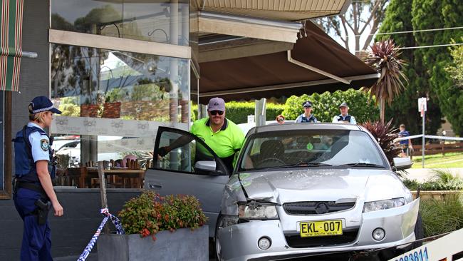 The silver commodore outside North Epping Shopping Village. Picture: Toby Zerna