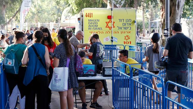 Israeli youths arrive to receive the Pfizer vaccine in Tel Aviv. Picture: AFP