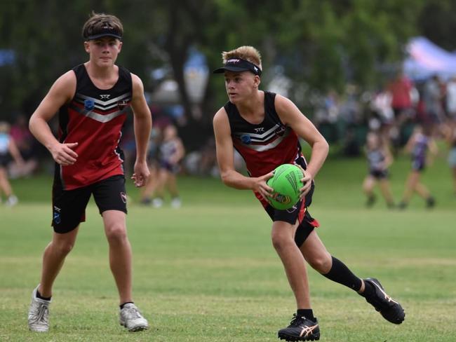 Zac Jones (with ball) and Will Hanlon (without ball) of Singleton Touch. Picture: Supplied