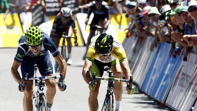 Alejandro Valverde (left) narrowly beats Simon Gerrans (right) across the line in 2012.