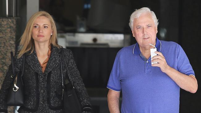 Clive Palmer and his wife Anna (left) leaving the Federal Court after giving evidence at the public examination of the collapse of Queensland Nickel. Picture: Claudia Baxter