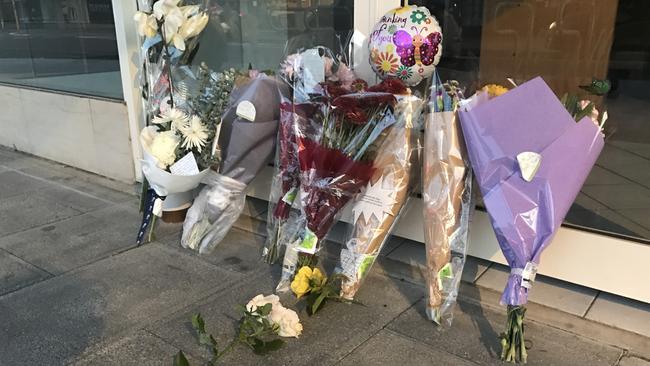 Flowers left at the scene of a brawl that ended in the death of Mount Gambier man Rex Court. Picture: Simon Cross