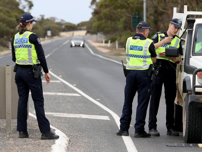 South Australian Police stopping vehicles near the SA border 5kms east of Pinnaroo, South Australia.