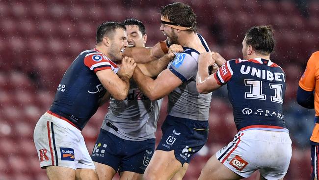 James Tedesco and Christian Welch tussle after the Sam Walker tackle. Picture: NRL Photos