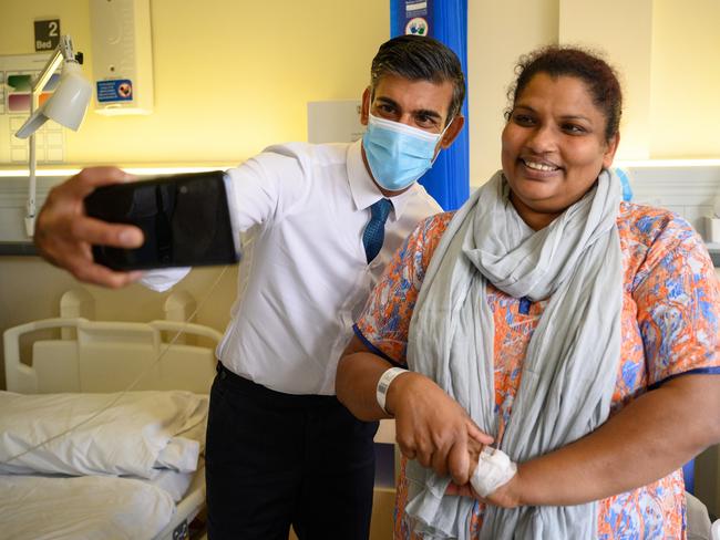 LONDON, ENGLAND - OCTOBER 28: Prime Minister Rishi Sunak speaks with patient Sreeja Gopalan as he visits Croydon University hospital on October 28, 2022 in London, England. The Prime Minister is reported to be reviewing proposals for next monthÃ¢â¬â¢s autumn statement, in a bid to raise up to ÃÂ£50 billion a year through a combination of spending cuts and tax rises. (Photo by Leon Neal - WPA Pool/Getty Images) *** BESTPIX ***