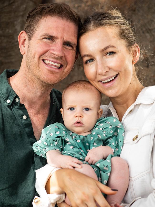 Sam Mac (McMillan) with his partner Rebecca James and their daughter Margot. Picture: Julian Andrews