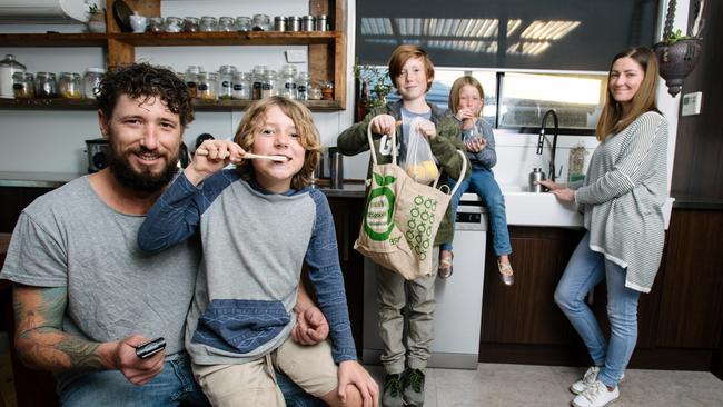 Noah, 9, Charlee, 7, Amber, Eris, 12, and Dave Howard with their plastic free alternatives. Picture: AAP/Morgan Sette