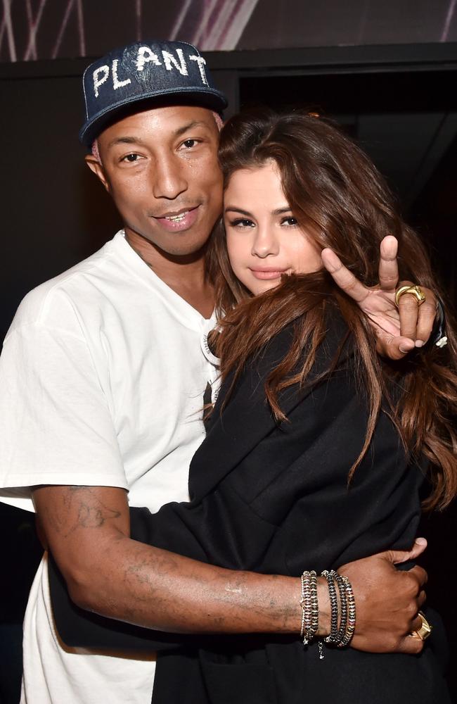 Pharrell Williams and Selena Gomez poses in the broadcast room during the iHeartRadio Music Awards. Picture: Getty