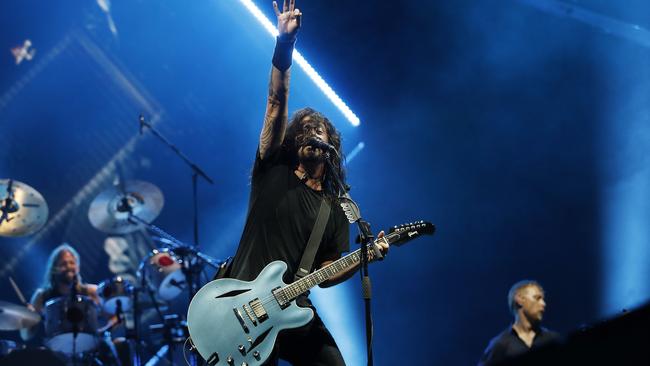 Dave Grohl out front of Foo Fighters at Brisbane’s Suncorp Stadium last night. Picture: Josh Woning/AAP