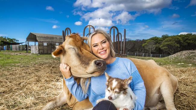 Kate Elena with rescue chihuahua Pablo and Aurora the cow at Deathrow Unchained. Picture: Nigel Hallett