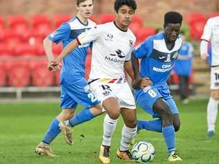 UNDER PRESSURE: SWQ Thunder midfielder Emmanuel Philip (right) attempts to win the ball of Magpies Crusaders opponent Makhaya Quakawoot. Picture: Nev Madsen