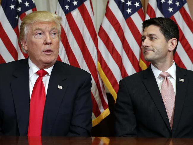 Trump and House Speaker Paul Ryan pose for photographers after a meeting in the Speaker's office on Capitol Hill. Picture: Alex Brandon/AP