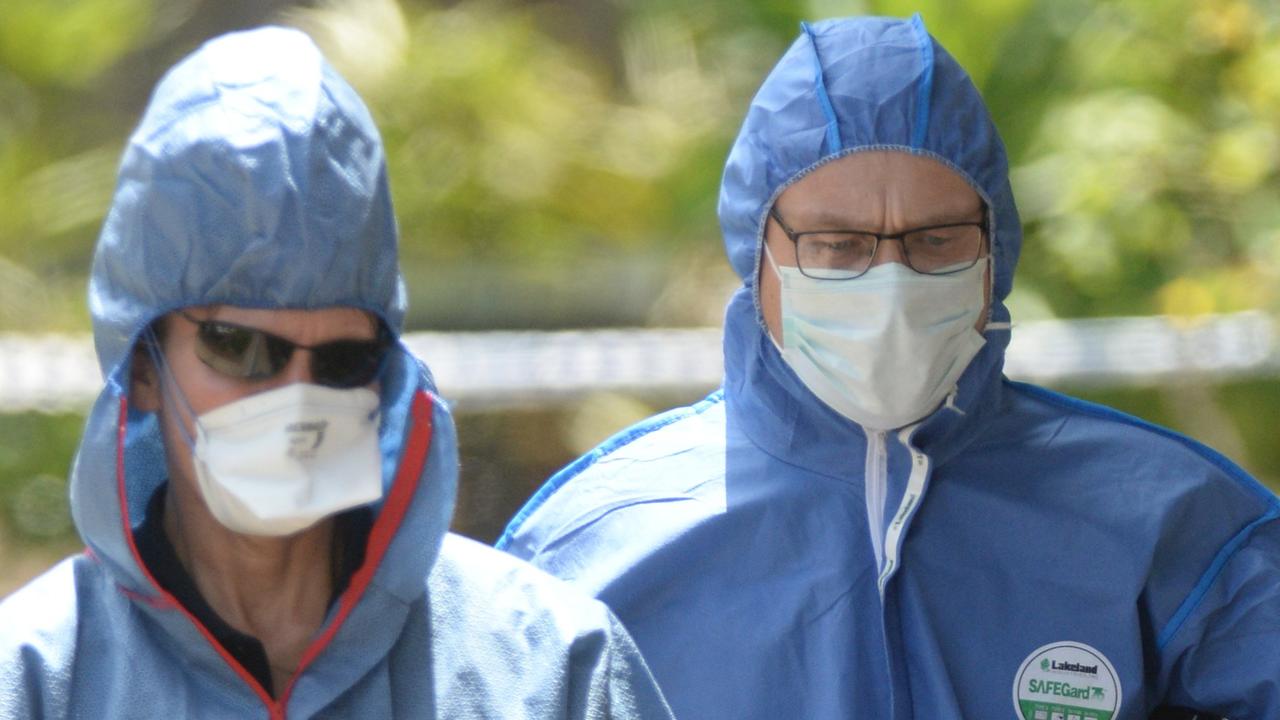 Police at the scene of a homicide in a unit complex on Bergin Street in Booval in 2019.