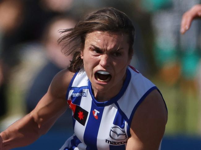 MELBOURNE, AUSTRALIA - SEPTEMBER 15: Ash Riddell of the Kangaroos celebrates kicking a goal during the round three AFLW match between Melbourne Demons and North Melbourne Kangaroos at Casey Fields, on September 15, 2024, in Melbourne, Australia. (Photo by Daniel Pockett/AFL Photos/via Getty Images)