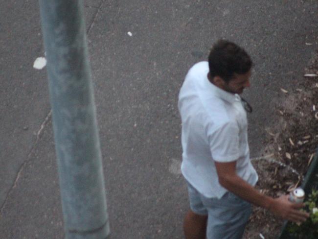 A man urinating on a house near the public reserve in East Esplanade. Picture: Supplied.