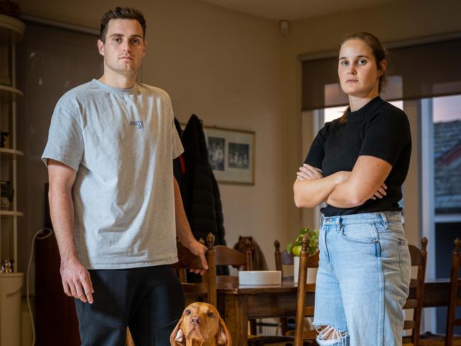 Hame invasion in Brighton. Melbourne. Annabel Thomson found two masked intruders in her home. Annabel is joined by her sisterÃs boyfriend Todd Blasse and her dog Austin in the spot where the intruders were found. Picture: Jake Nowakowski