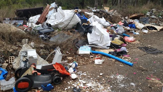 Moorabool Shire Council began investigating after staff were notified of this mess on Reservoir Rd, Coimadai. Picture: Supplied