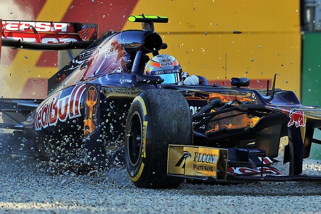 Toro Rosso driver Jean-Eric Vergne comes of at turn three early in the race. Picture: Craig Borrow