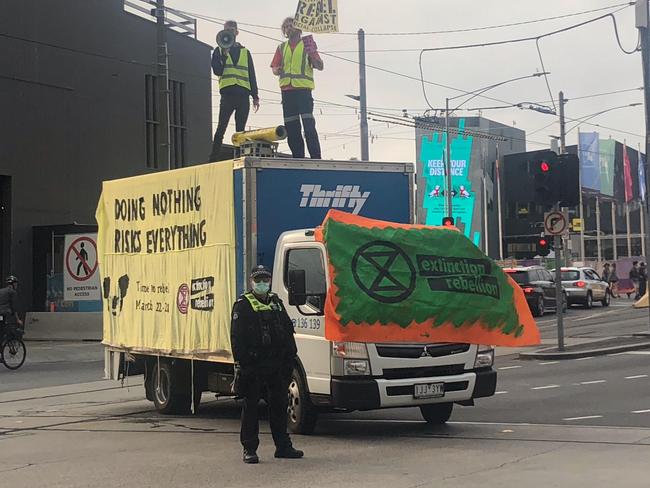 Extinction rebellion protestors at cnr Swanston st and Flinders st this morning. Picture: Supplied