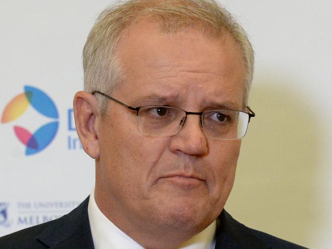 MELBOURNE, AUSTRALIA - NewsWire Photos DECEMBER 14, 2021: Prime Minister Scott Morrison at The Peter Doherty Institute for Infection and Immunity in Melbourne for the announcement of a deal for local manufacture of the Moderna Covid vaccine. Picture: NCA NewsWire / Andrew Henshaw