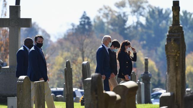 Joe Biden, centre, arrives at St. Joseph on the Brandywine Roman Catholic Church in Wilmington, Delaware, on Monday (AEDT). Picture: AFP