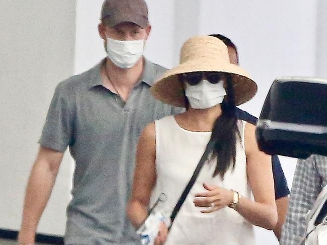 ONE TIME WEB USE FOR NEWS.COM.AU ONLY - FEES APPLY FOR REUSE -   - Meghan Markle and Prince Harry seen leaving the dermatologist in Beverly Hills. Meghan looks classy in a white dress and straw hat.    Pictured: Meghan Markle, Prince Harry    BACKGRID Australia 10 JULY 2020     BYLINE MUST READ: Javiles/Bruce / BACKGRID    Phone: + 61 419 847 429  Email:  sarah@backgrid.com.au *CLIENT RESTRICTION APPLIED*