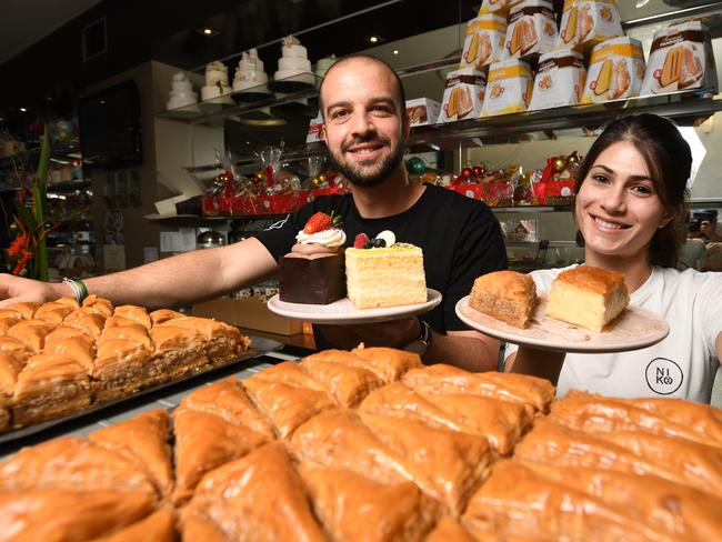 Yianni Poupouzas, left, and Lampathaki Christina at Nikos Cakes. Picture: James Ross