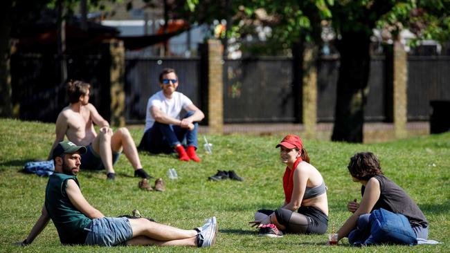 Britons enjoy warm weather at London Fields in east London on April 24.