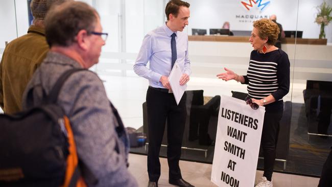 Chris Smith supporters meet with Macquarie Media National Executive Producer Michael Thompson to protest line-up changes. Picture: James Gourley