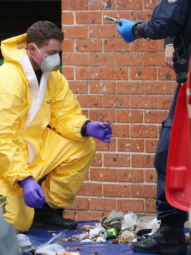 Forensic officers spent much of Monday sifting through the property. Picture: Toby Zerna