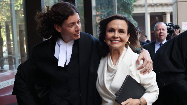 Barrister Sue Chrysanthou SC hugs Lisa Wilkinson as they emerge from court on April 15, 2024, in Sydney. Picture: Don Arnold/Getty Images