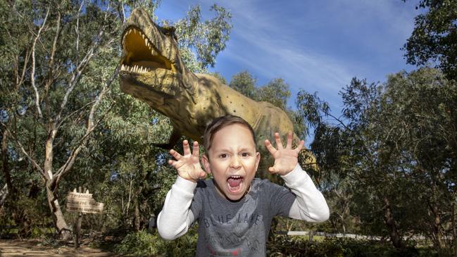 Xavier Soccio in front of Tyrannosaurus rex at "Zoorassic" at Werribee Zoo.