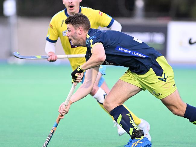 HOBART, AUSTRALIA - OCTOBER 20: Hayden Beltz of the Tasmanian Tigers dribbles the ball during the round four Hockey One League match between Tassie Tigers and Canberra Chill at Tasmanian Hockey Centre, on October 20, 2022, in Hobart, Australia. (Photo by Steve Bell/Getty Images)