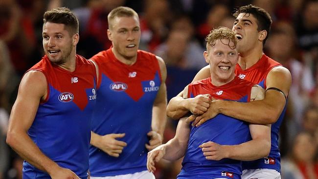 Jesse Hogan, Tom McDonald, Clayton Oliver and Christian Petracca are all smiles for the Demons. Picture: Getty Images