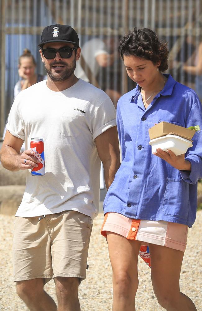 Zac Efron and Vanessa Valladares hold hands on a lunch outing in Byron Bay. Picture: Media-Mode.com