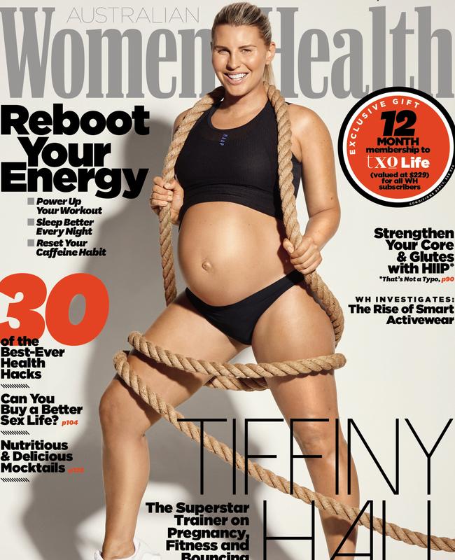 Tiffiny Hall poses pregnant on the cover of Women’s Health. Picture: Women's Health