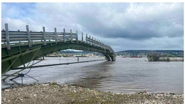 Allegedly unauthorised bridge over the North Esk River constructed by Launceston Councillor Joe Pentridge, a.k.a. Joseph John Pintarich. Pictured during flooding in October 2022. Picture: TasCAT