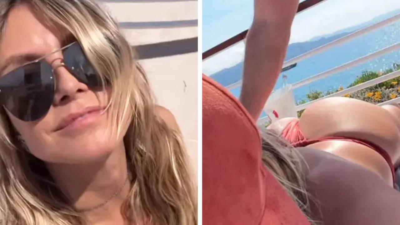 Heidi Klum strips down in bare-bum vid