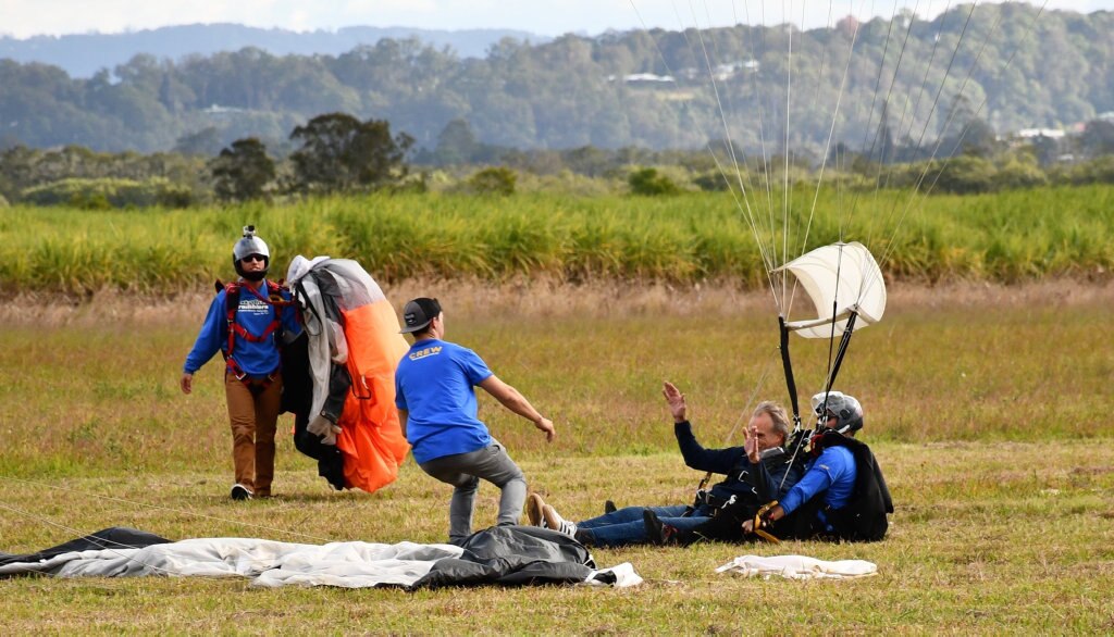 Bob Sherwell, who is about to turn 87, shares his second charity skydive with Pastor Joel Baker, of Flametree Baptist Church.