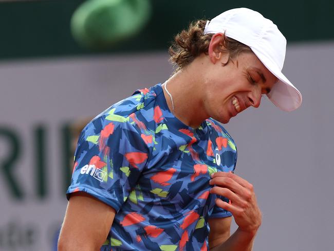 PARIS, FRANCE - MAY 24: Alex De Minaur of Australia reacts against Hugo Gaston of France during the Men's Singles First Round match on Day 3 of the French Open at Roland Garros on May 24, 2022 in Paris, France. (Photo by Adam Pretty/Getty Images)