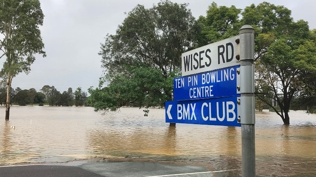 Wises Rd, Gympie, resembled a river on Saturday morning as the One Mile Ovals and surrounding businesses were inundated.