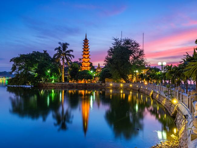 ESCAPE: THREE OF A KIND - HANOI .. Tran Quoc Pagoda on West Lake in Hanoi, Vietnam. Picture: Supplied