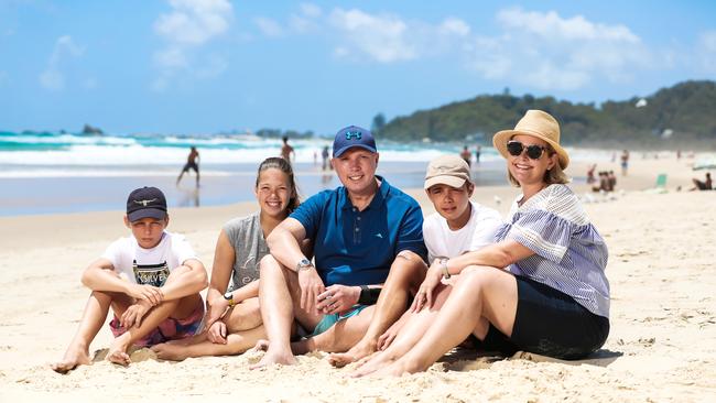 Peter Dutton and wife Kirilly with their two sons Harry, 14, Tom, 13 and daughter Rebecca taking a break on the Gold Coast. Picture: Nigel Hallett